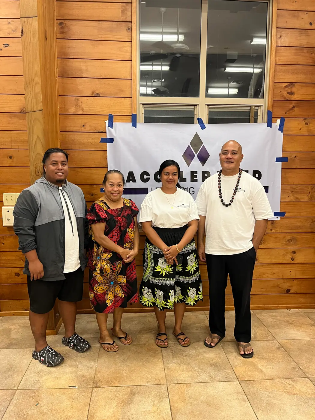 Accelerated Learning Center Board of Directors group photo, standing from left to right: JT Nonumwar, Kathy Sound, Memory Weita Lean, Atkin Buliche.